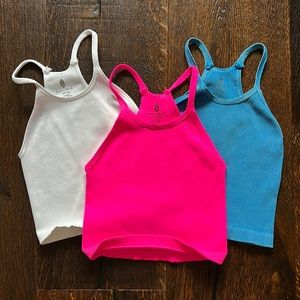 3 Happiness Runs Long Crop Tanks FP Movement - M/L - Pink, Blue, White